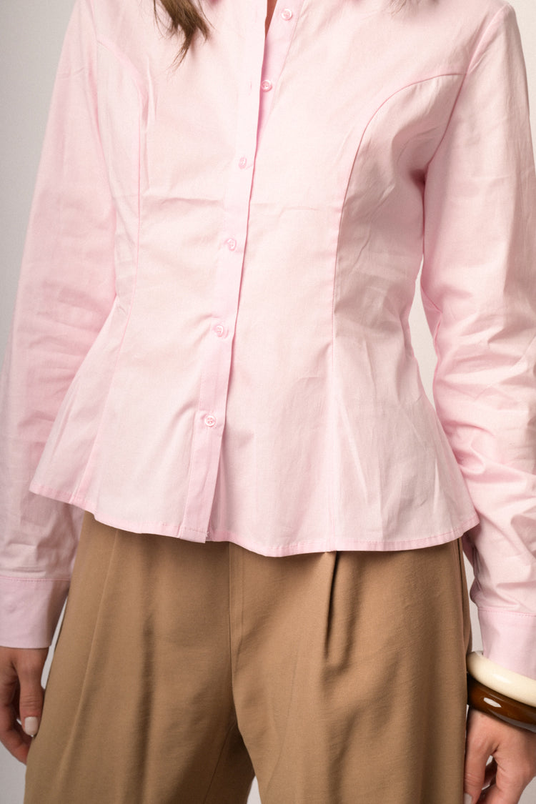Pink shirt with rhinestone button