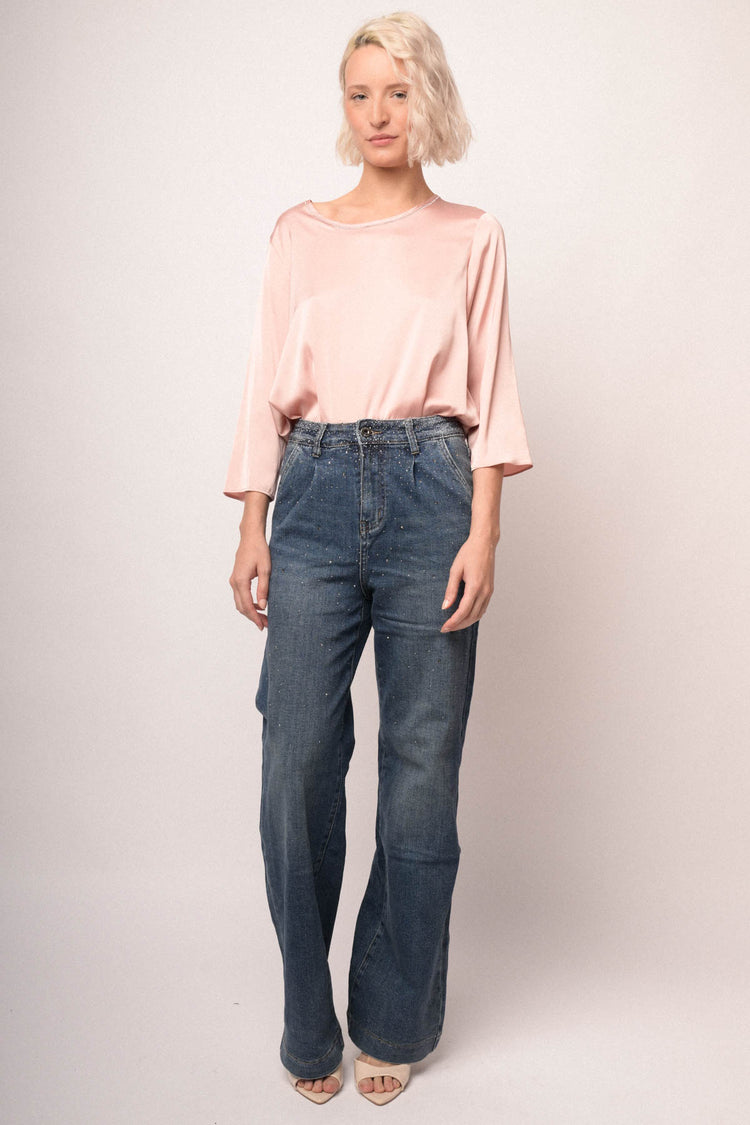 Jeans palazzo con pince e strass