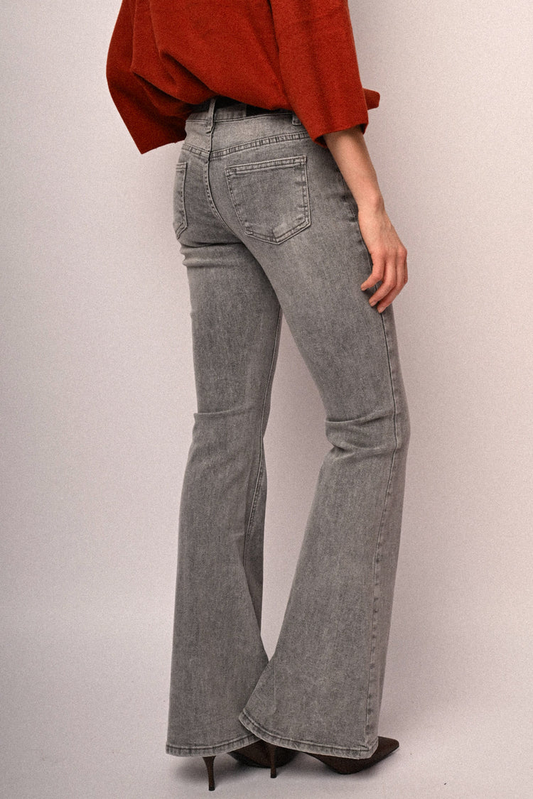 Belted glitter flared jeans