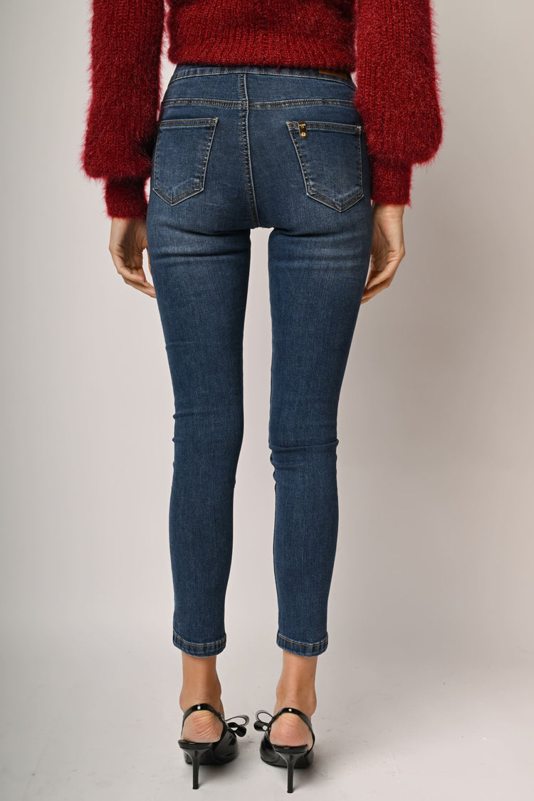Button-detail skinny jeans