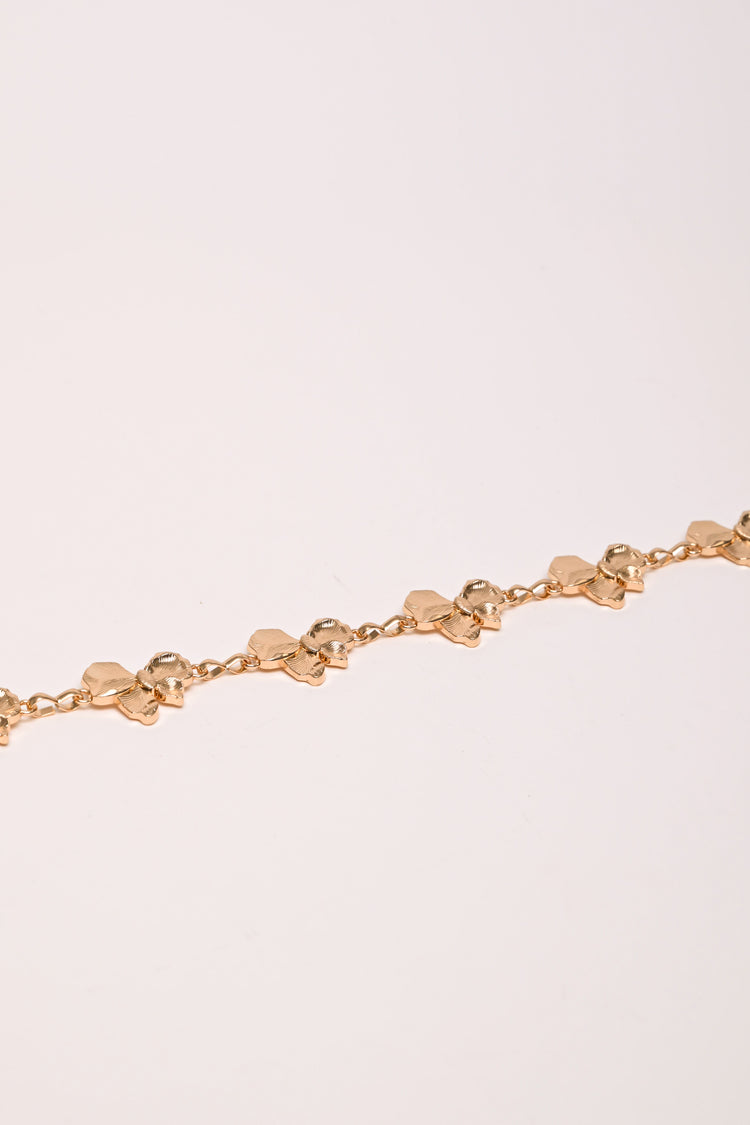 Bow chain belt