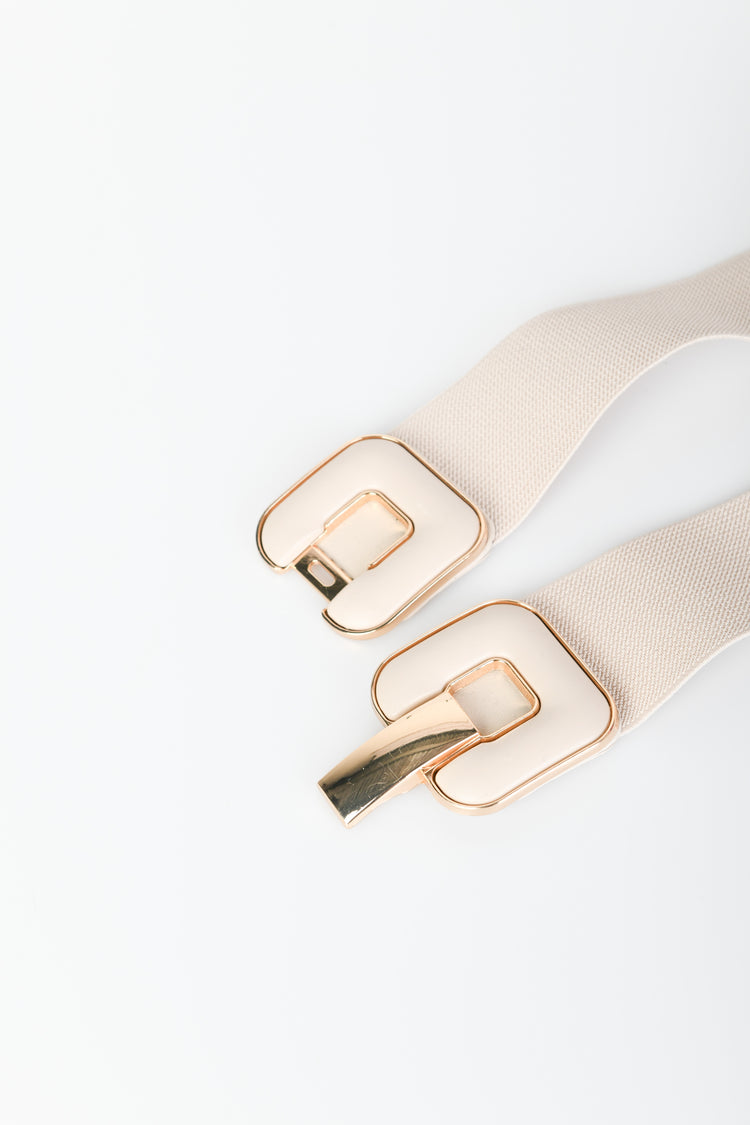 Enameled buckle elastic belt
