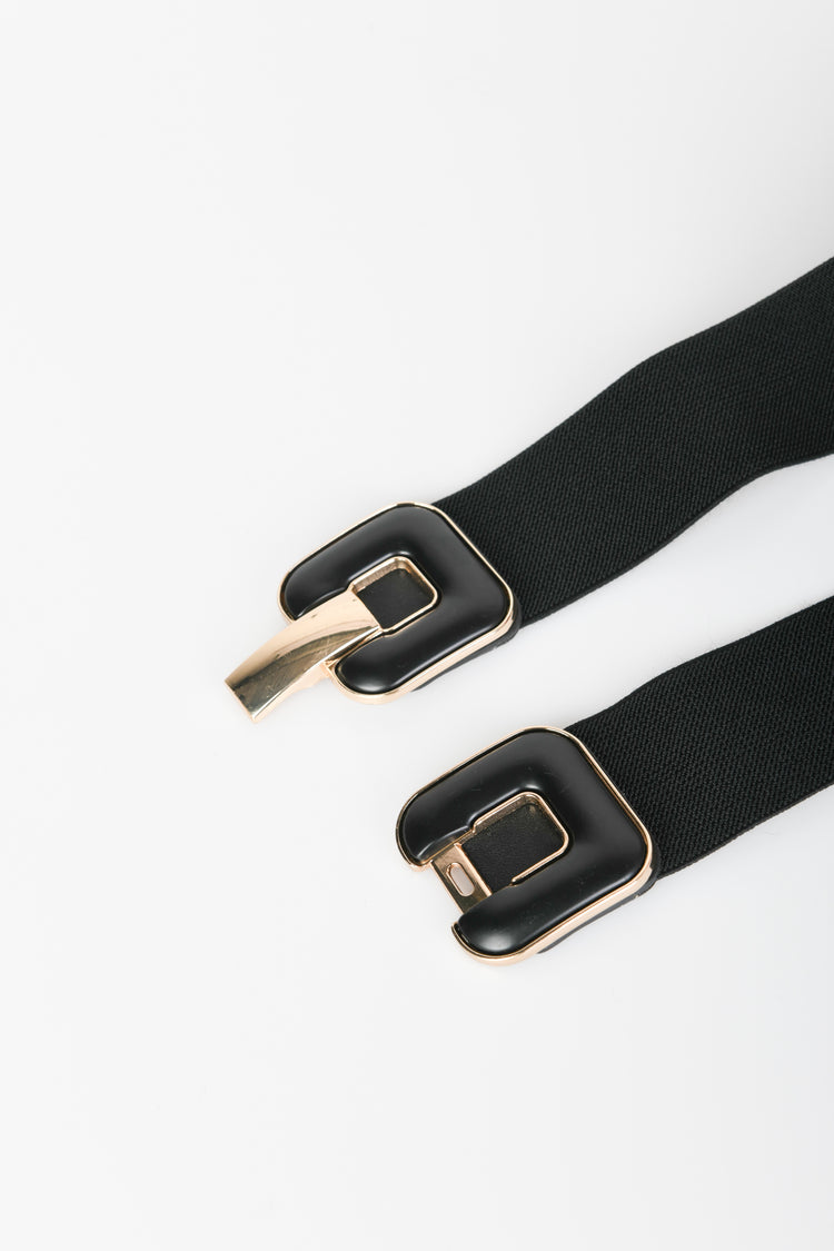 Enameled buckle elastic belt