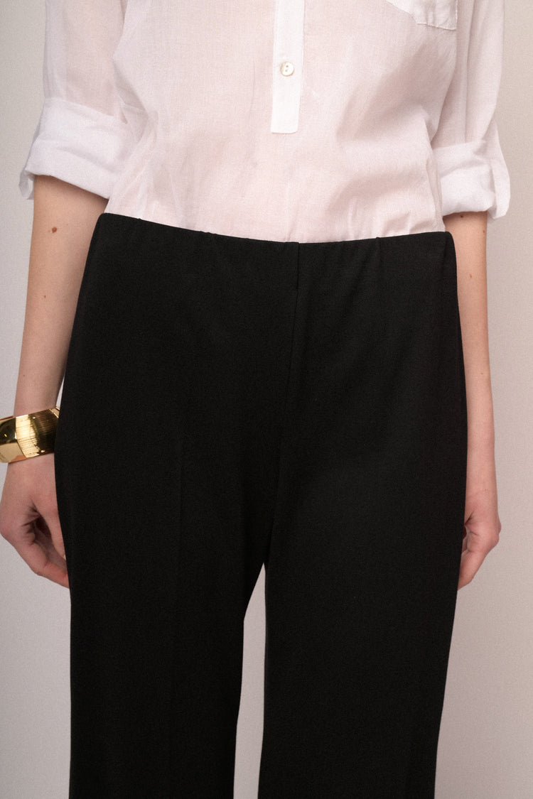Black jersey flared leg trousers