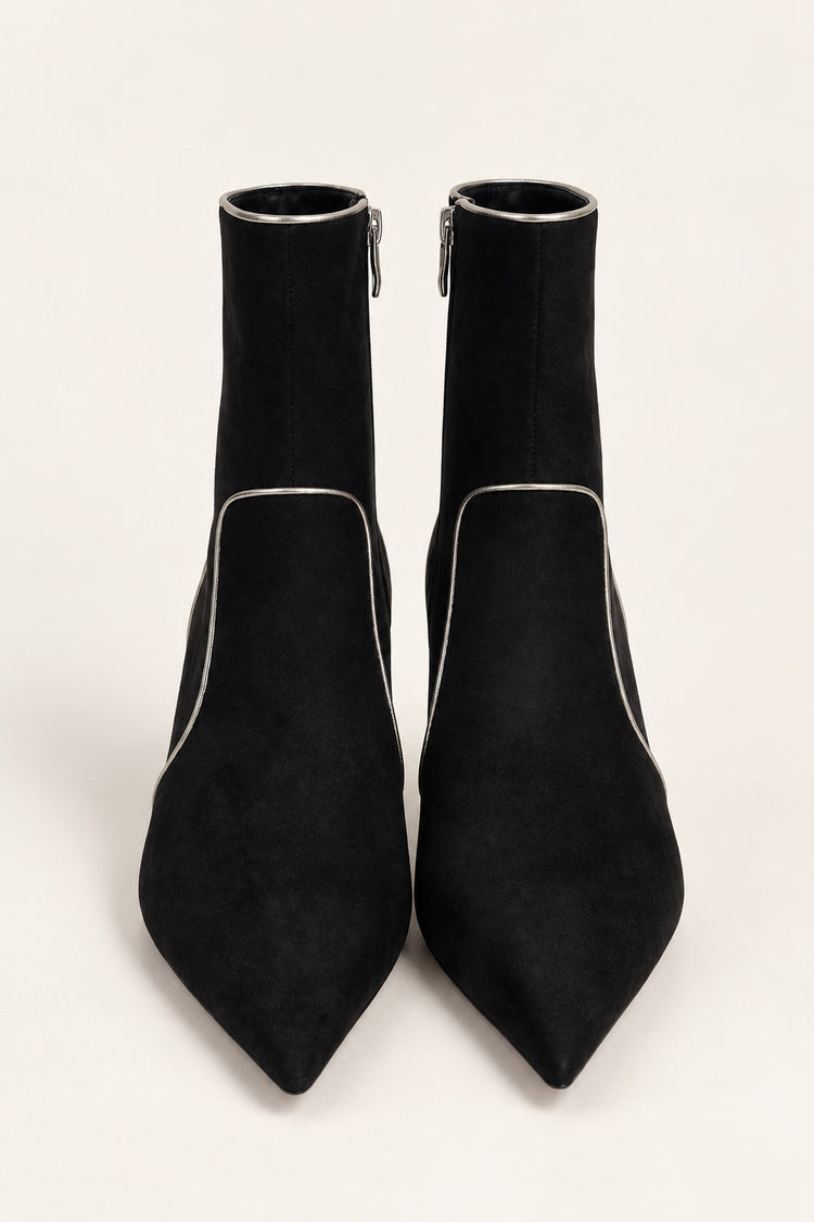 Black ankle boots with gold-tone piping