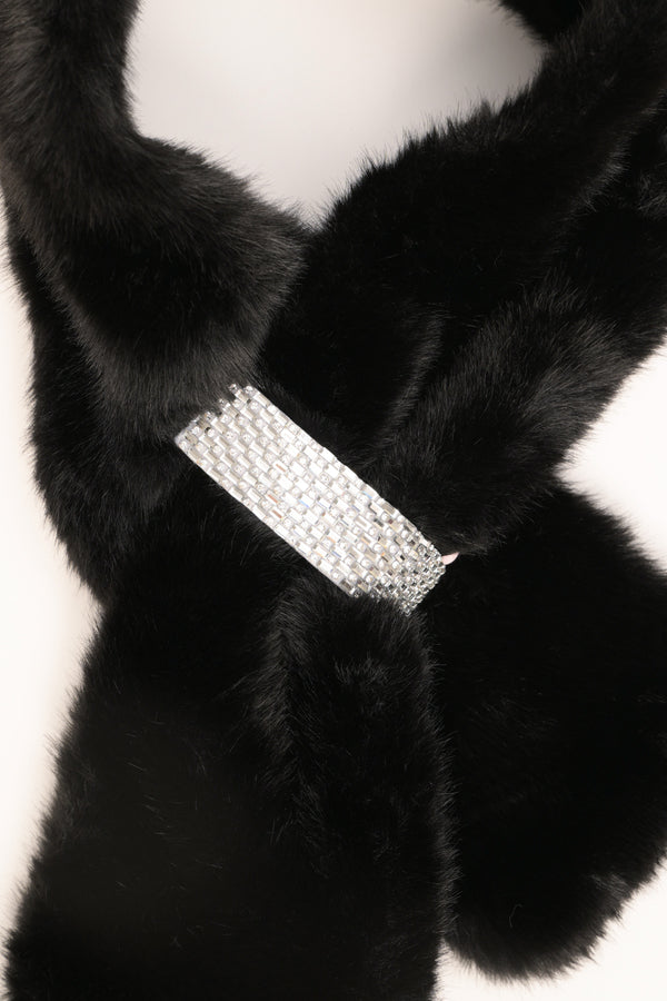Black plush neck warmer with rhinestone buckle