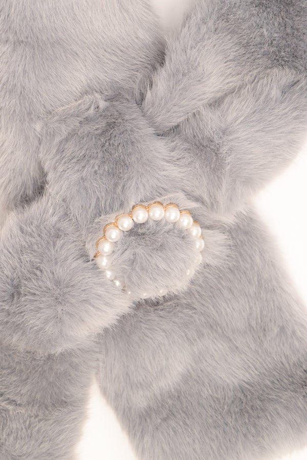 Grey plush neck warmer with round beaded buckle