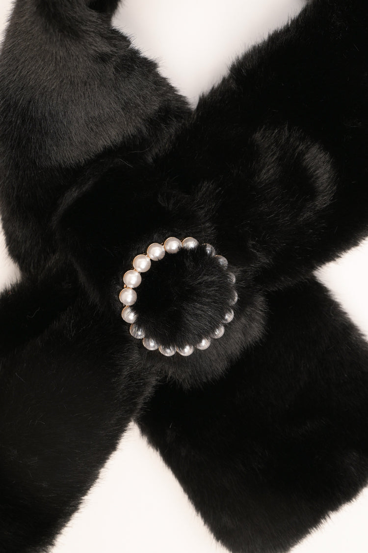 Black plush neck warmer with round beaded buckle
