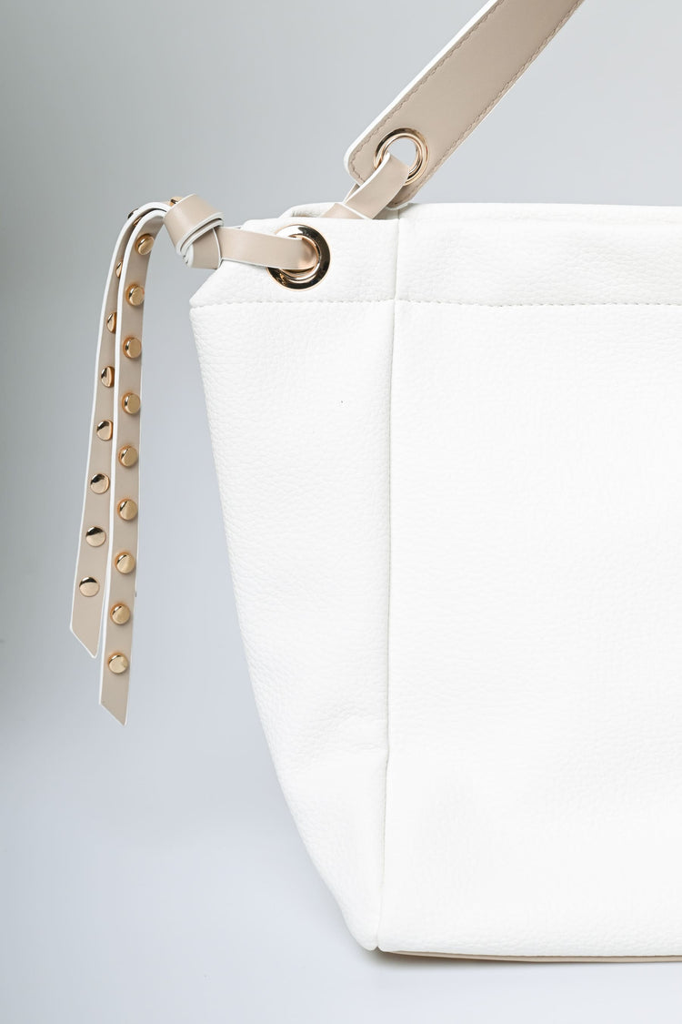Studded straps shoulder bag