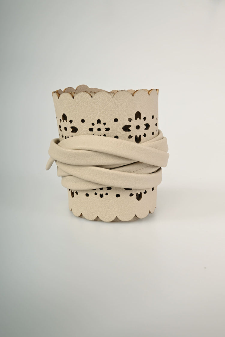Perforated motif sash belt
