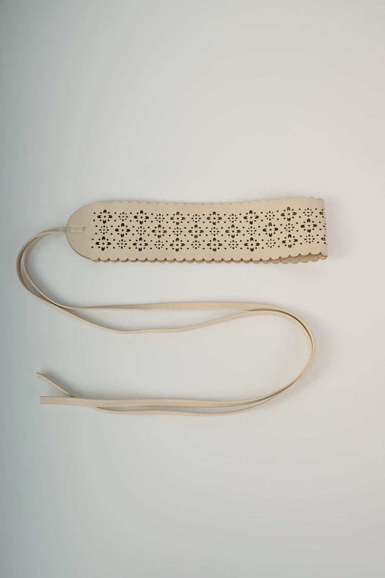 Perforated motif sash belt