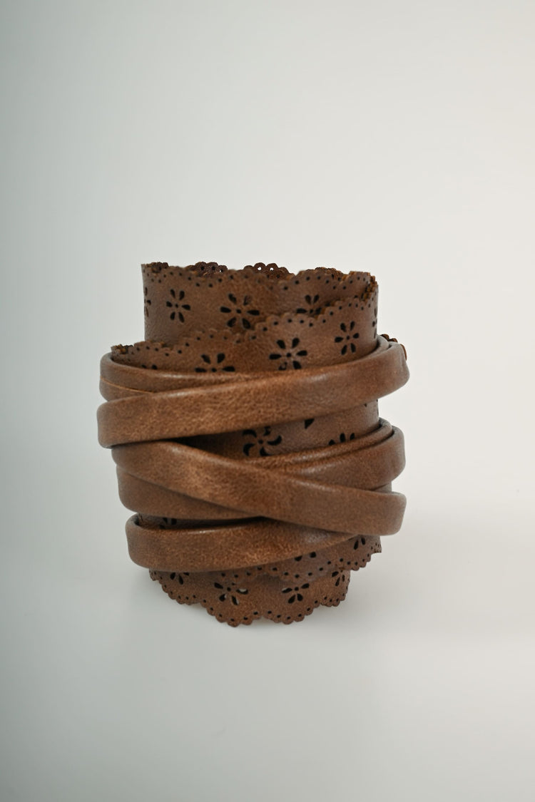 Perforated motif sash belt