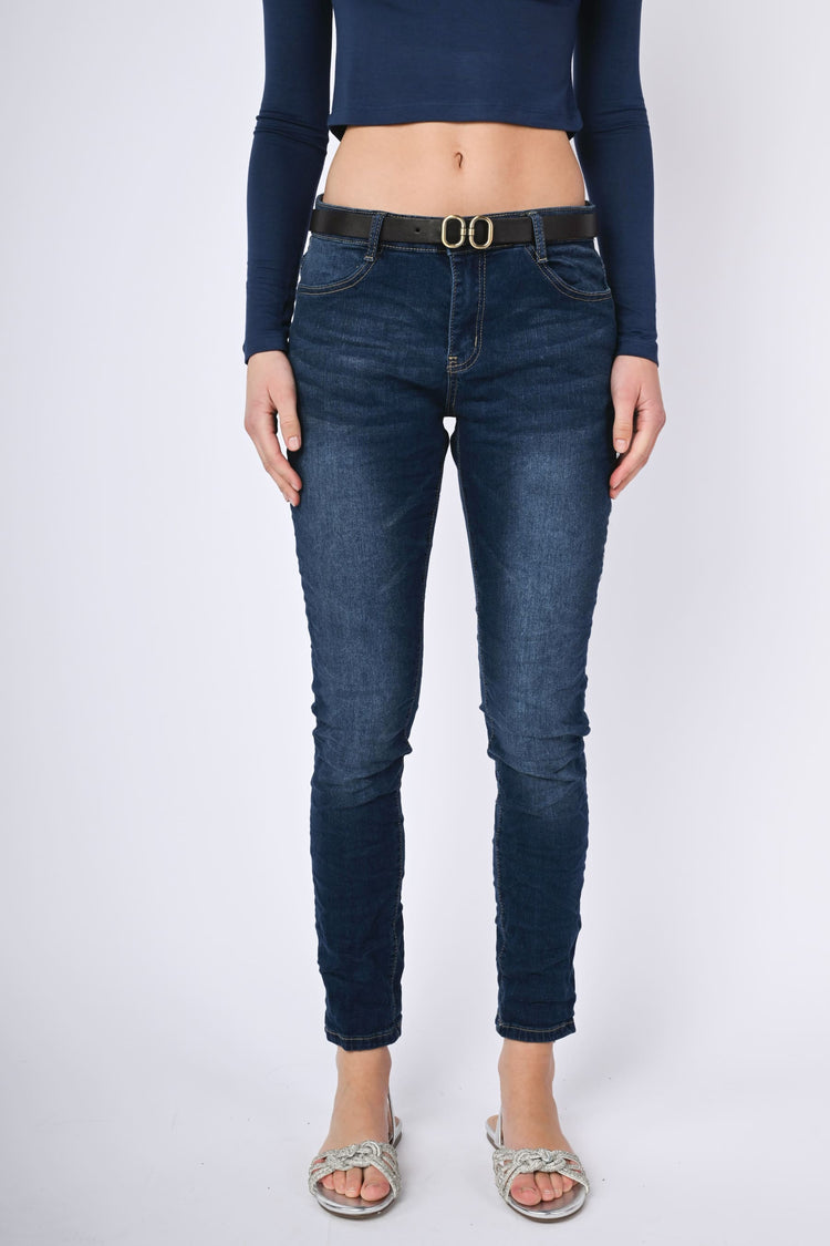 Belted skinny jeans