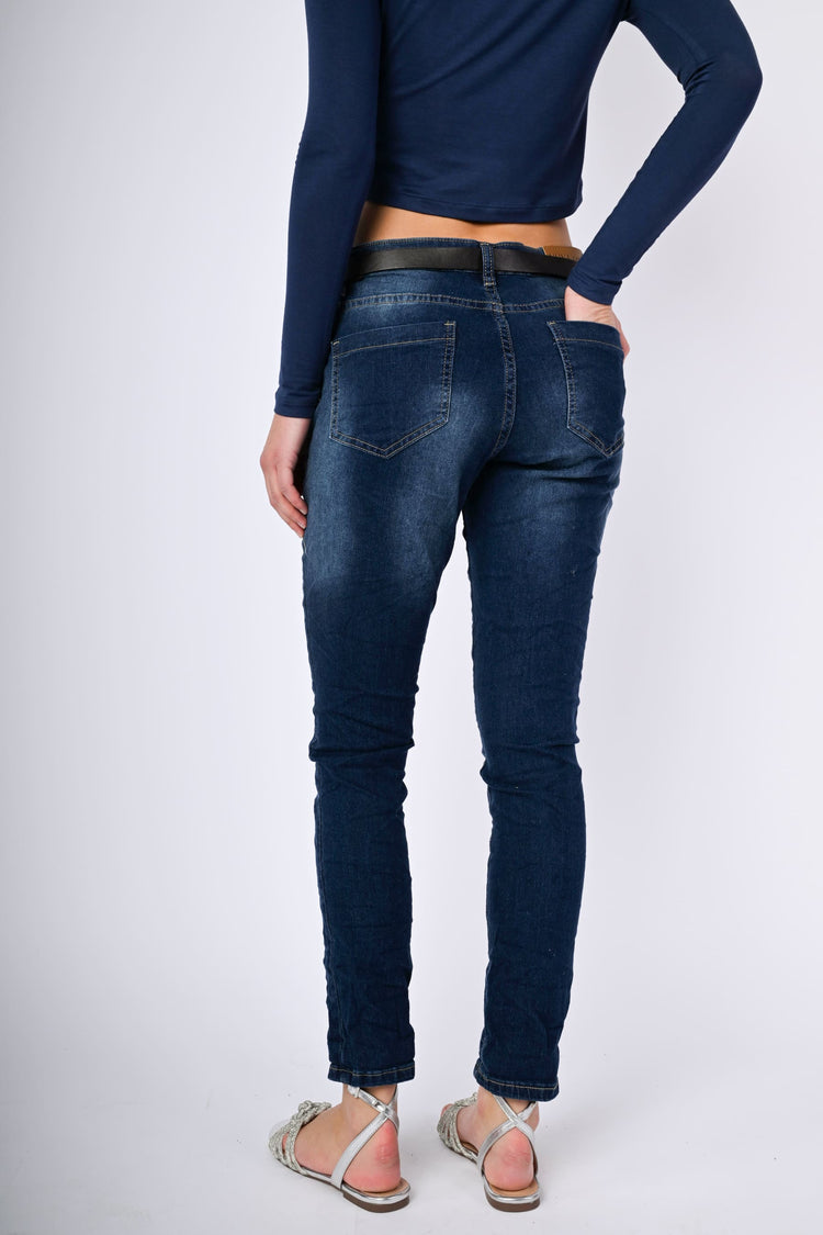 Belted skinny jeans