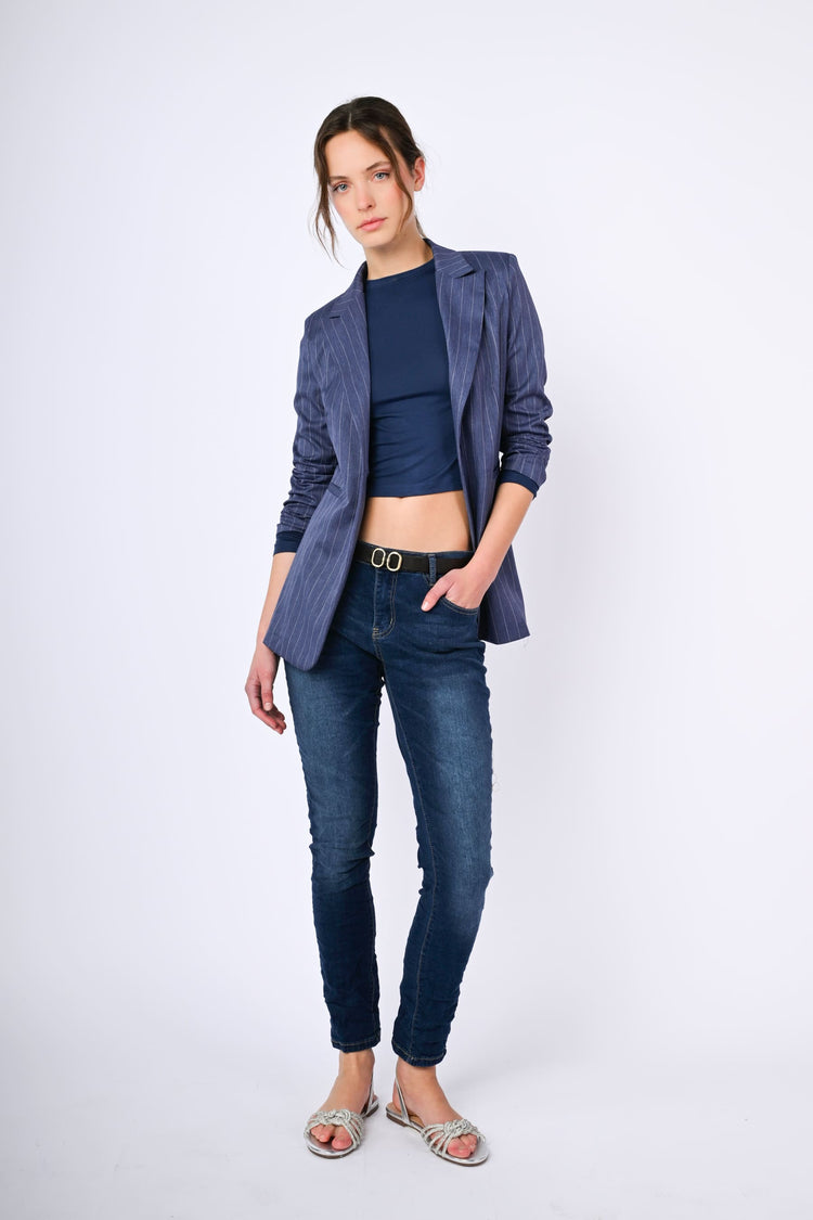 Belted skinny jeans