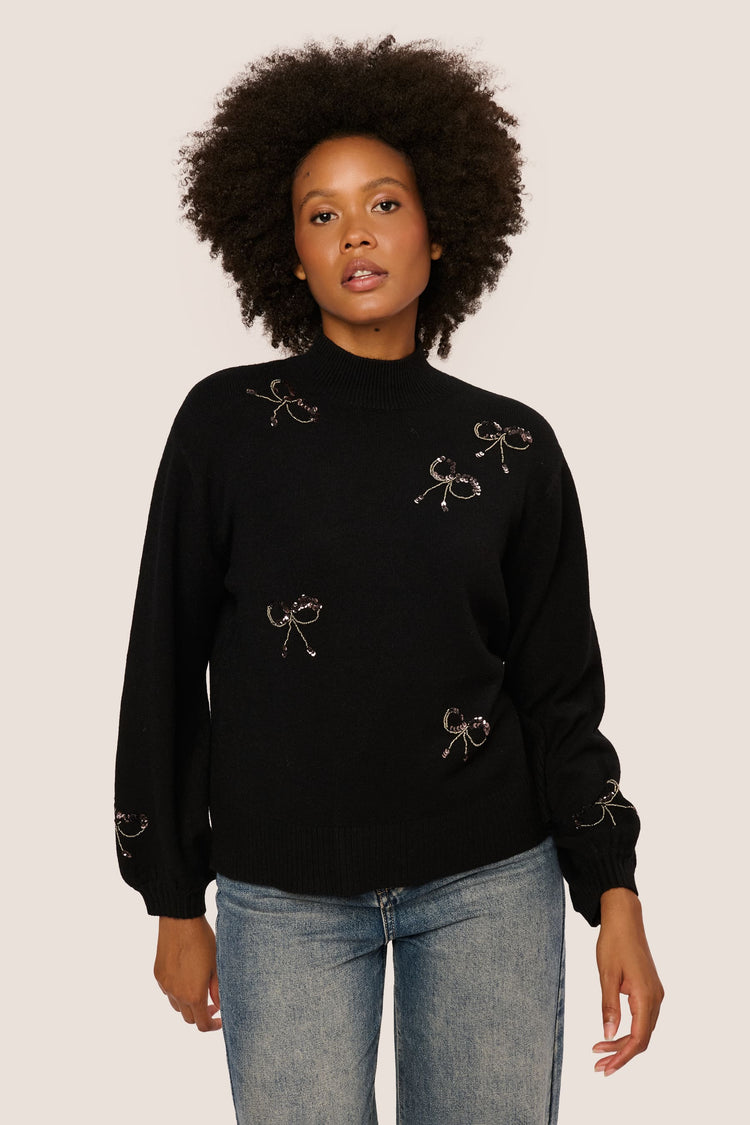 Sequin bows mock sweater