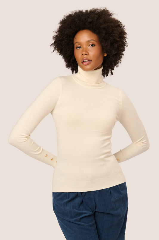 Buttoned cuff turtleneck