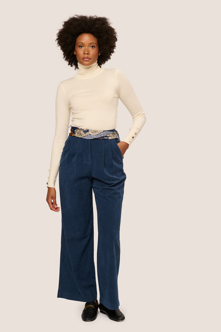 Buttoned cuff turtleneck