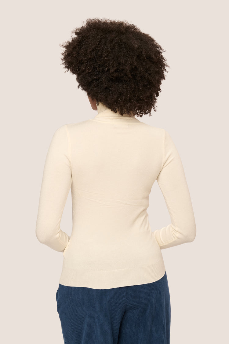 Buttoned cuff turtleneck