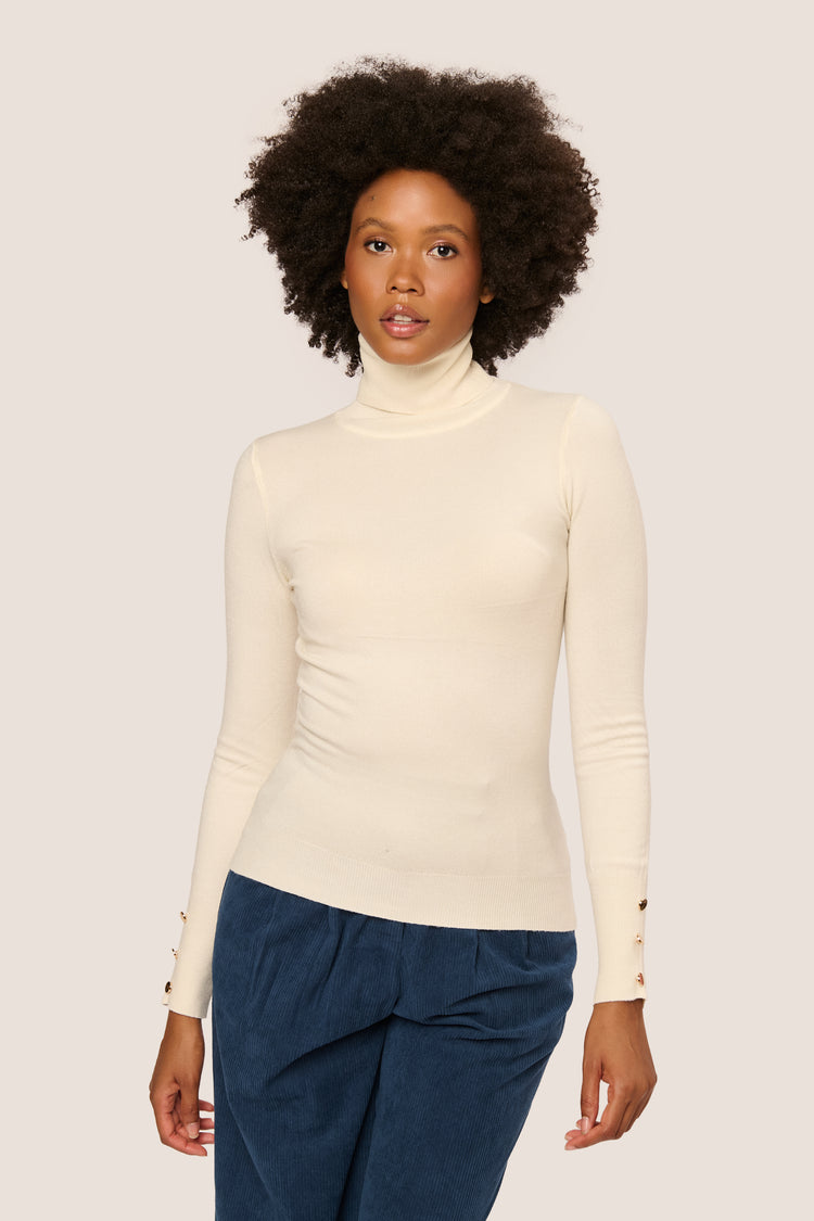 Buttoned cuff turtleneck