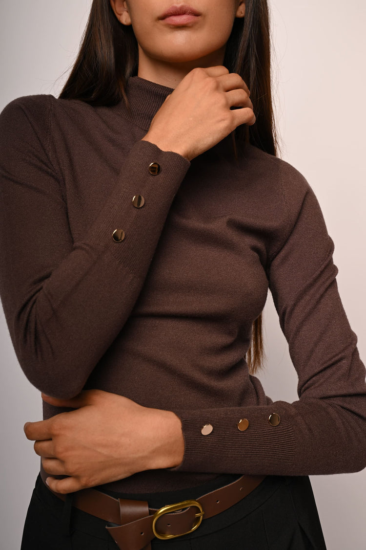 Buttoned cuff turtleneck