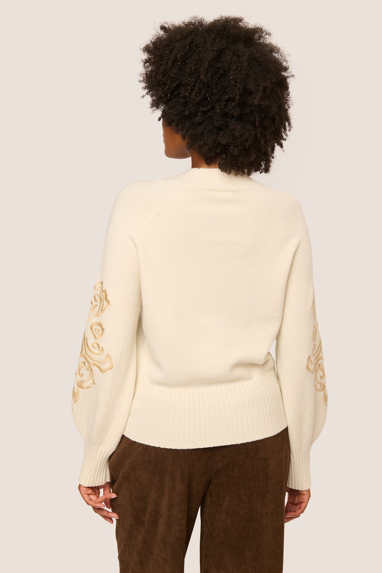 Embroidered sleeves mock sweater
