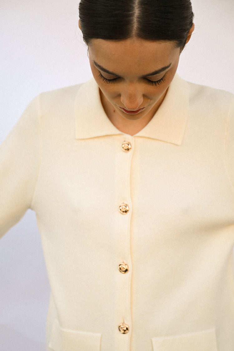 Cappotto con tasche e bottoni