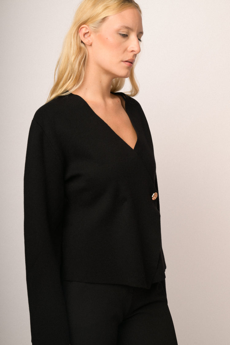 Cardigan incrocio con bottone