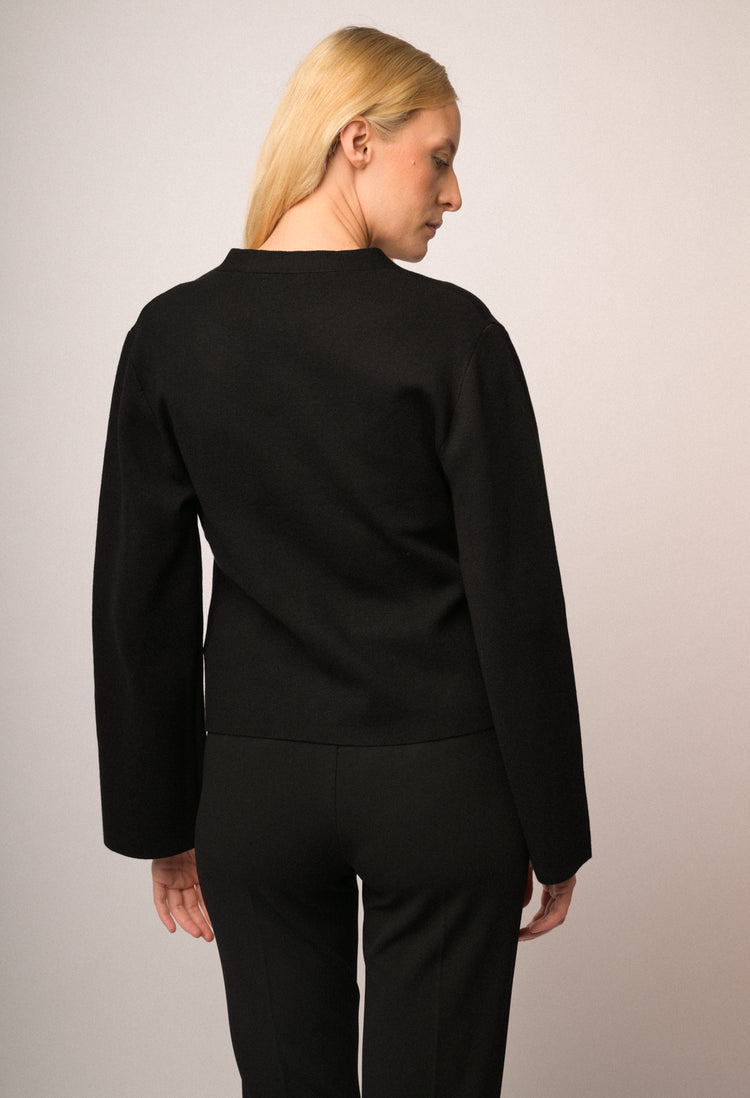 Cardigan incrocio con bottone