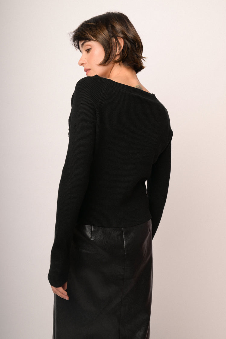 Maglia buchi con bottoni