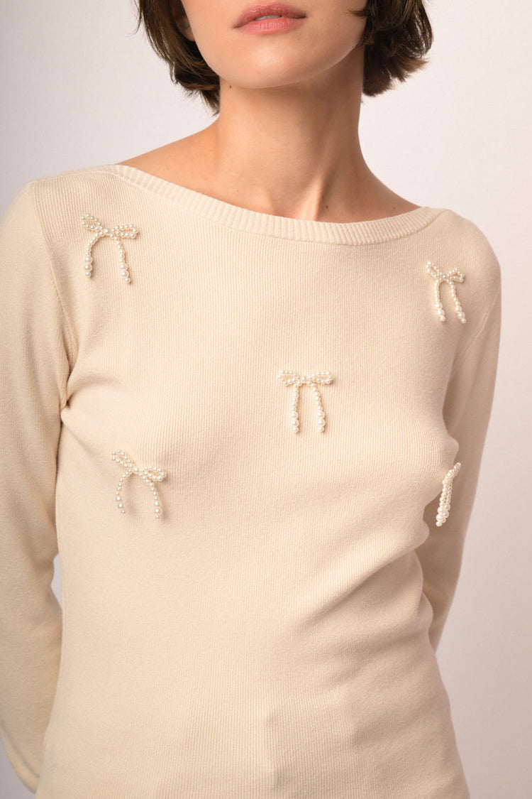 Maglia shiffer con fiocchi perline
