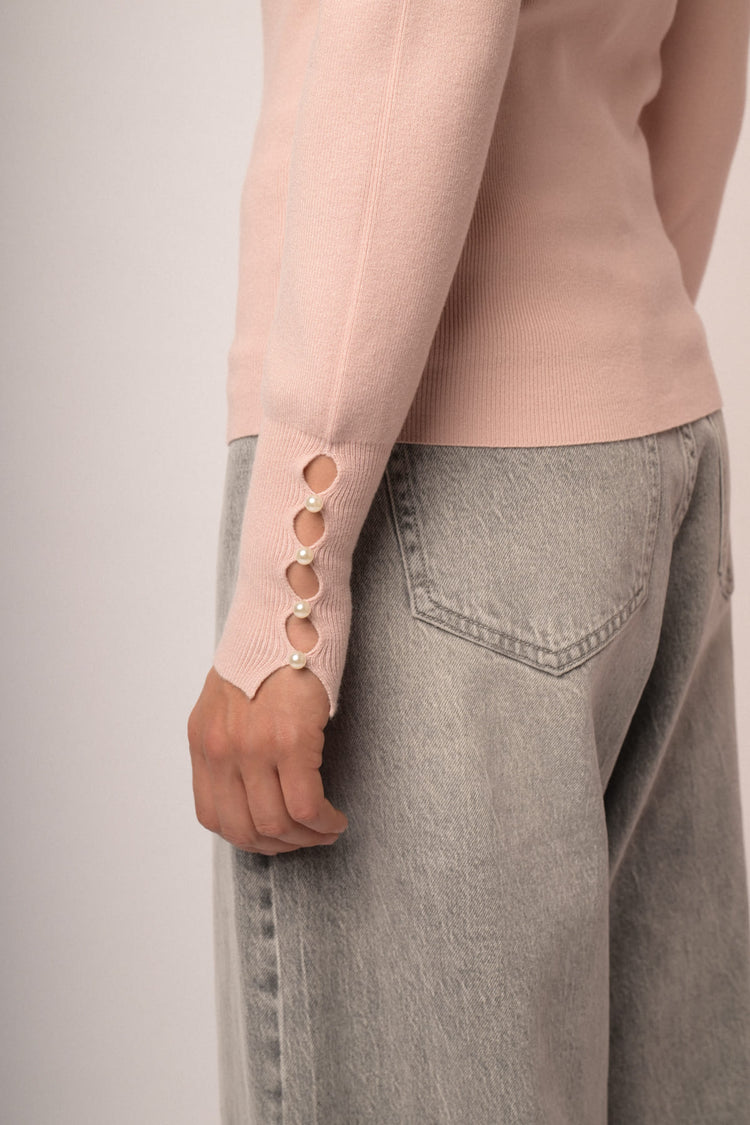Maglia shiffer con fiocchi perline