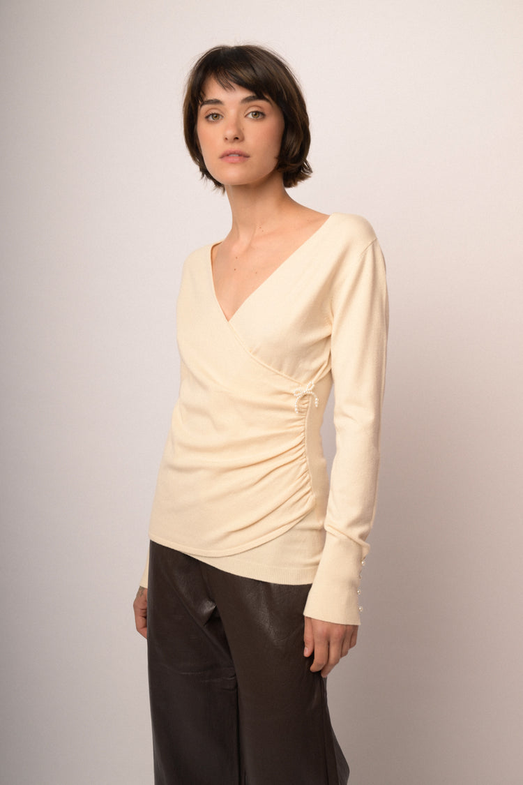 Maglia incrocio con fiocchi perline