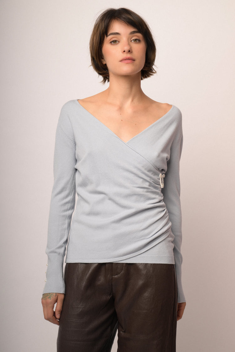 Maglia incrocio con fiocchi perline