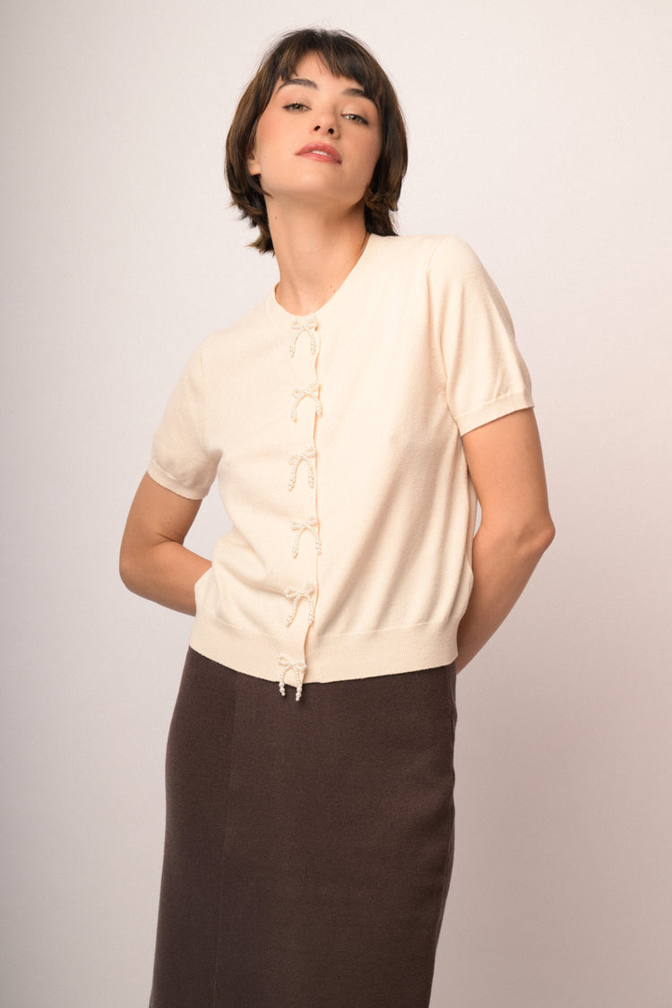 Beige short-sleeved cardigan with beaded bows