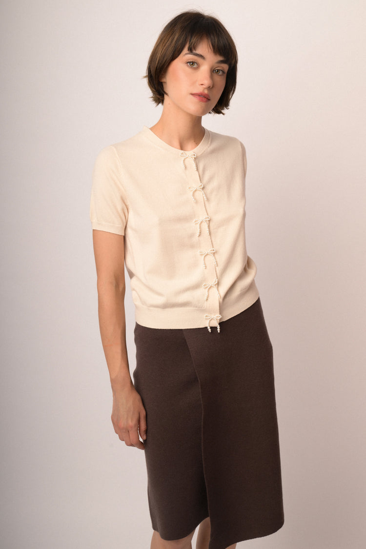 Beige short-sleeved cardigan with beaded bows