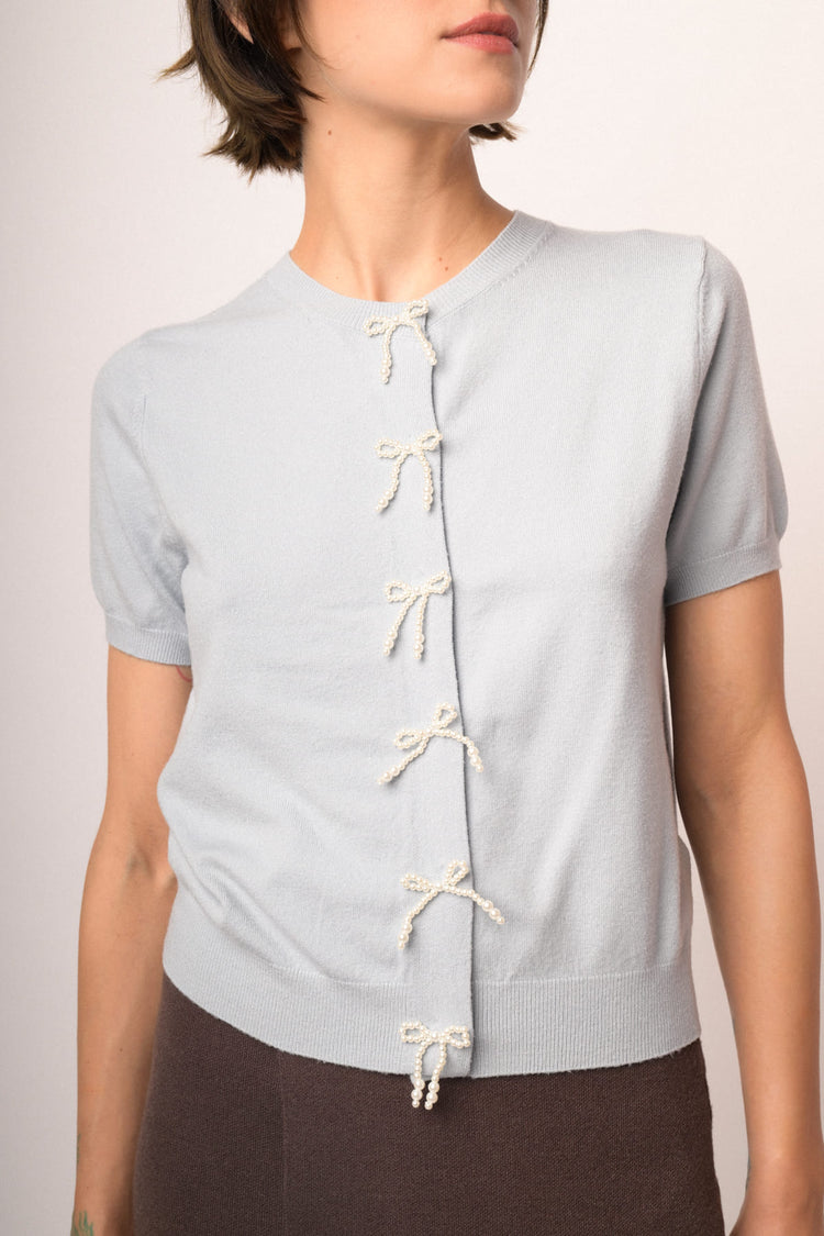 Sky-blue short-sleeved cardigan with beaded bows