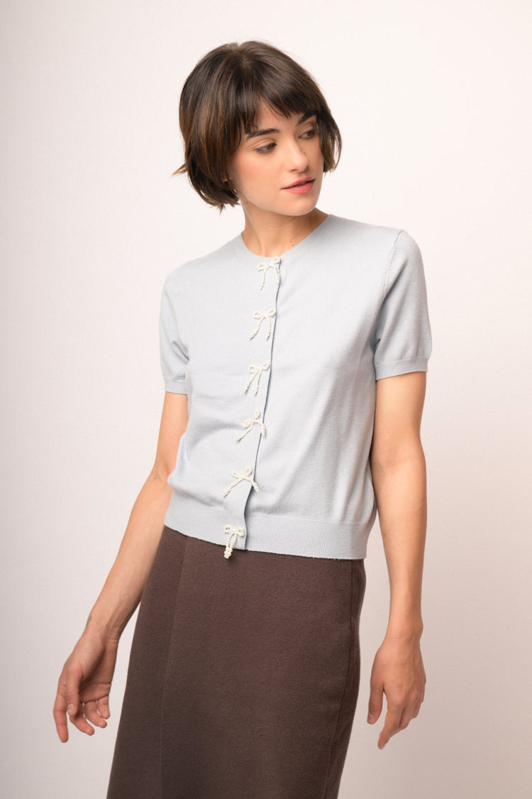 Sky-blue short-sleeved cardigan with beaded bows