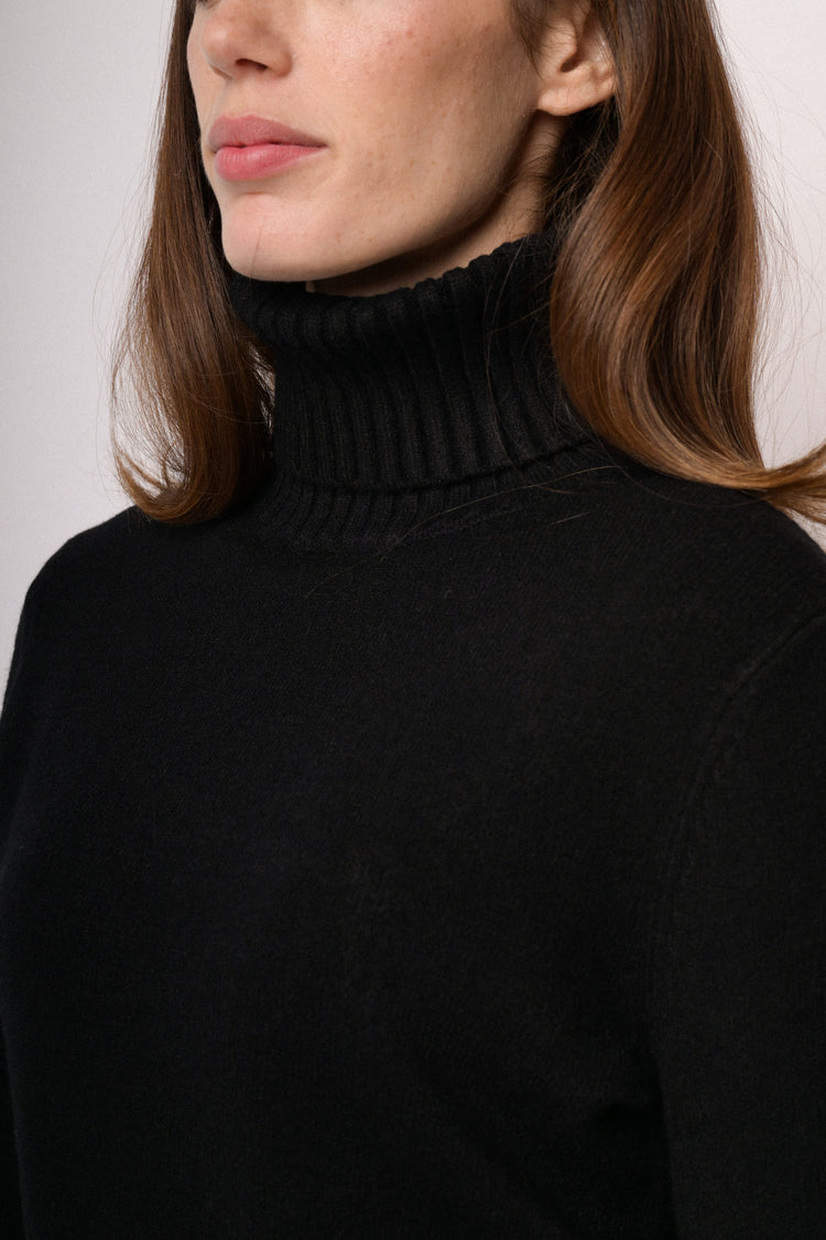 Black ribbed turtleneck sweater
