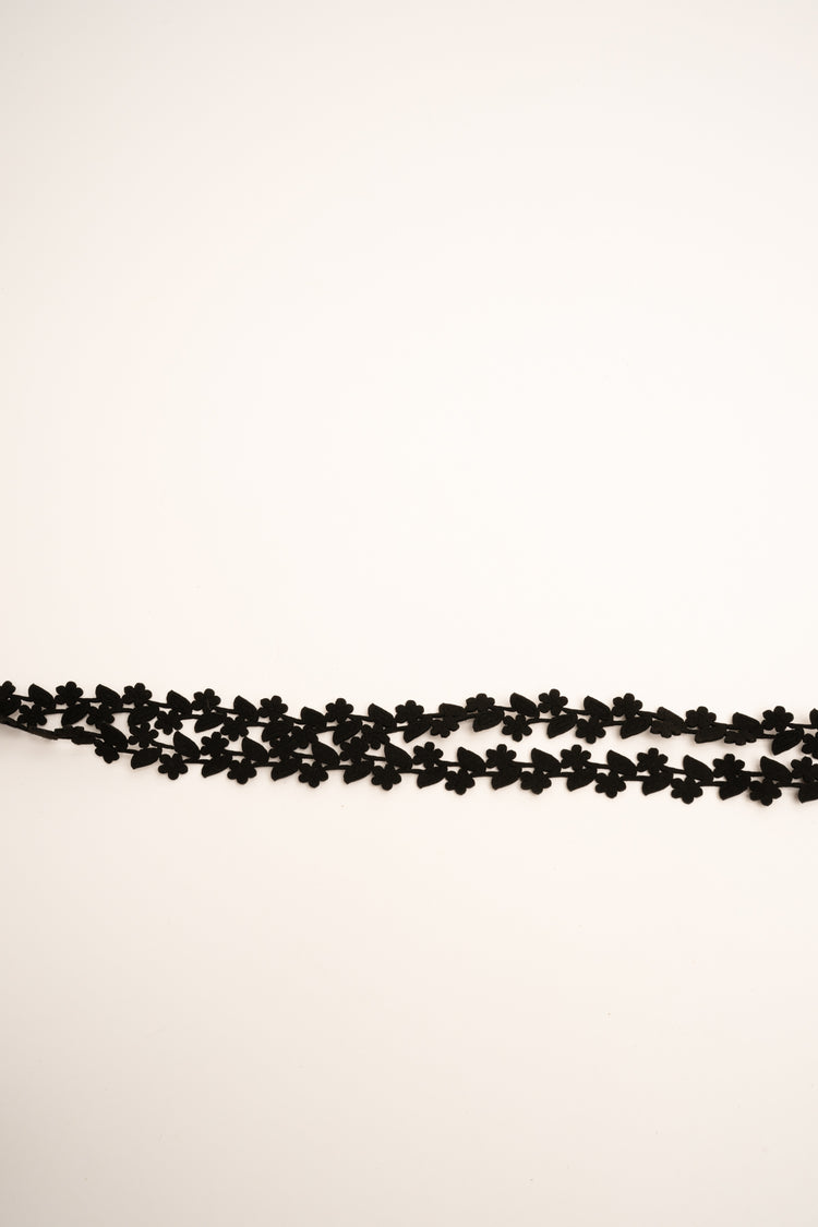 Fringed tassels and floral motif black faux suede slim belt