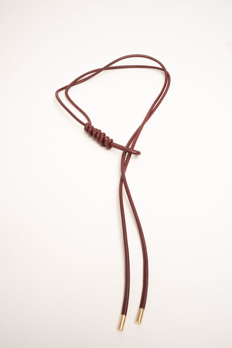 Burgundy knotted sash belt