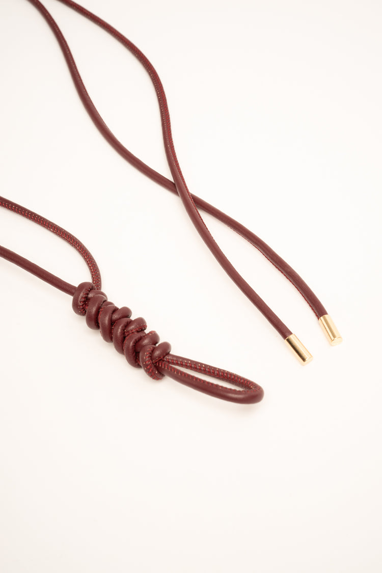 Burgundy knotted sash belt