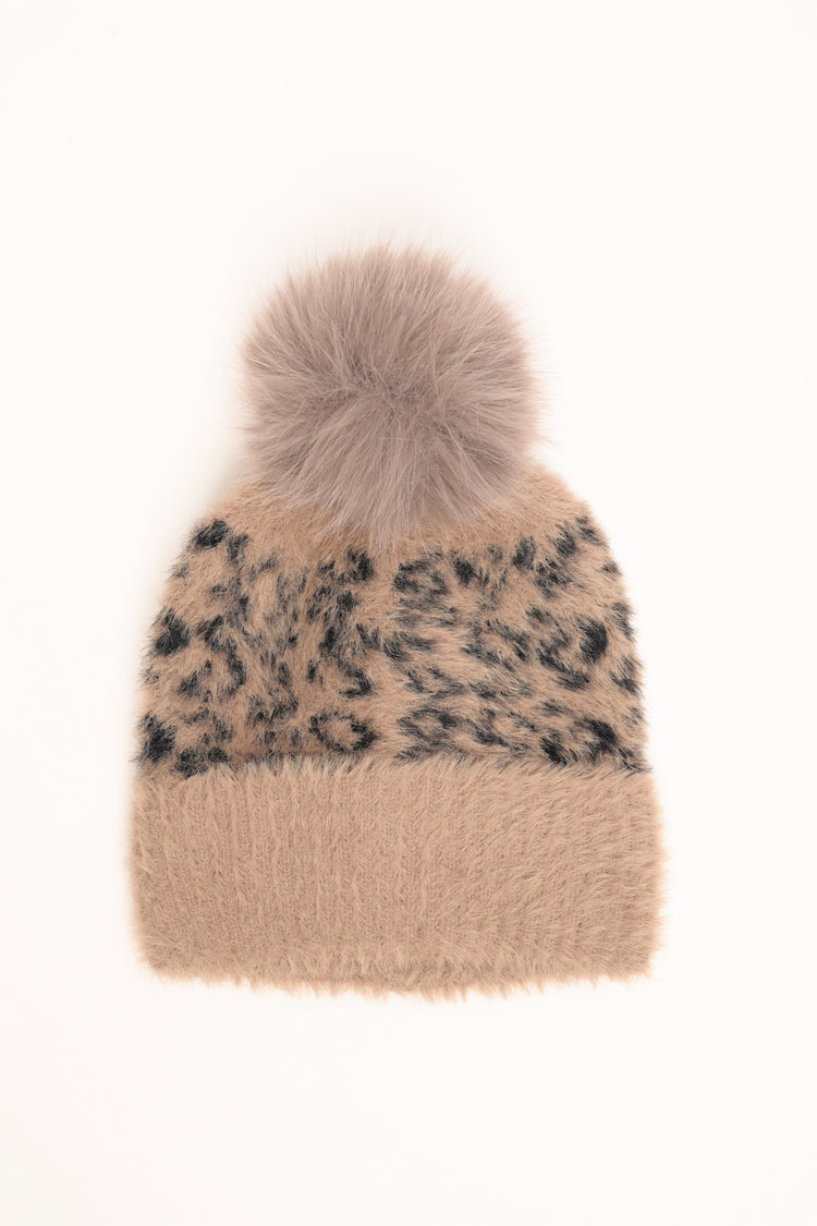 Beige-black animal-pattern hat with pom-pom
