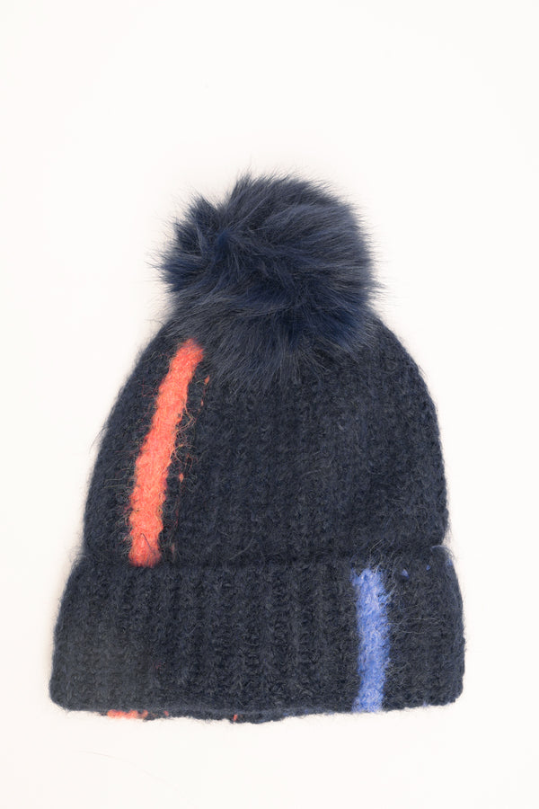 Blue hat with pom-pom detailing