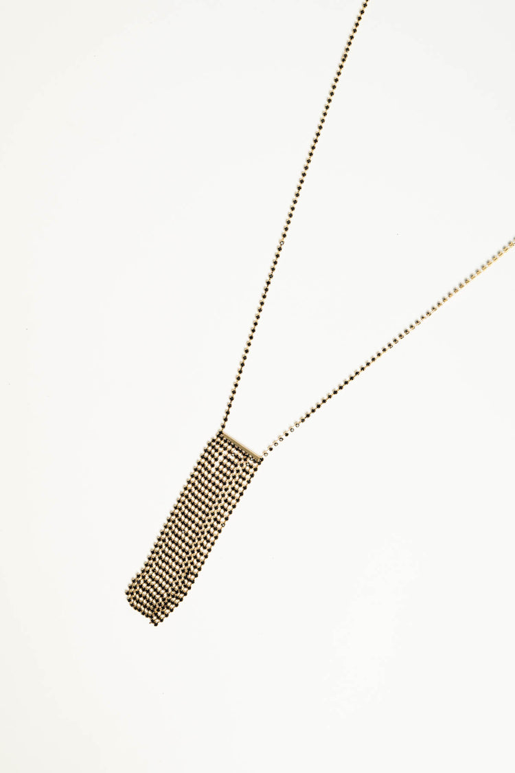 Black necklace with rectangular pendant and gold-tone details