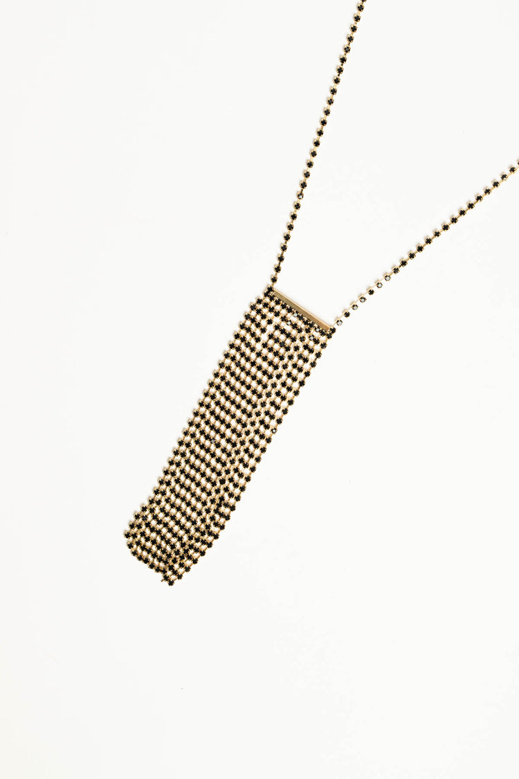 Black necklace with rectangular pendant and gold-tone details