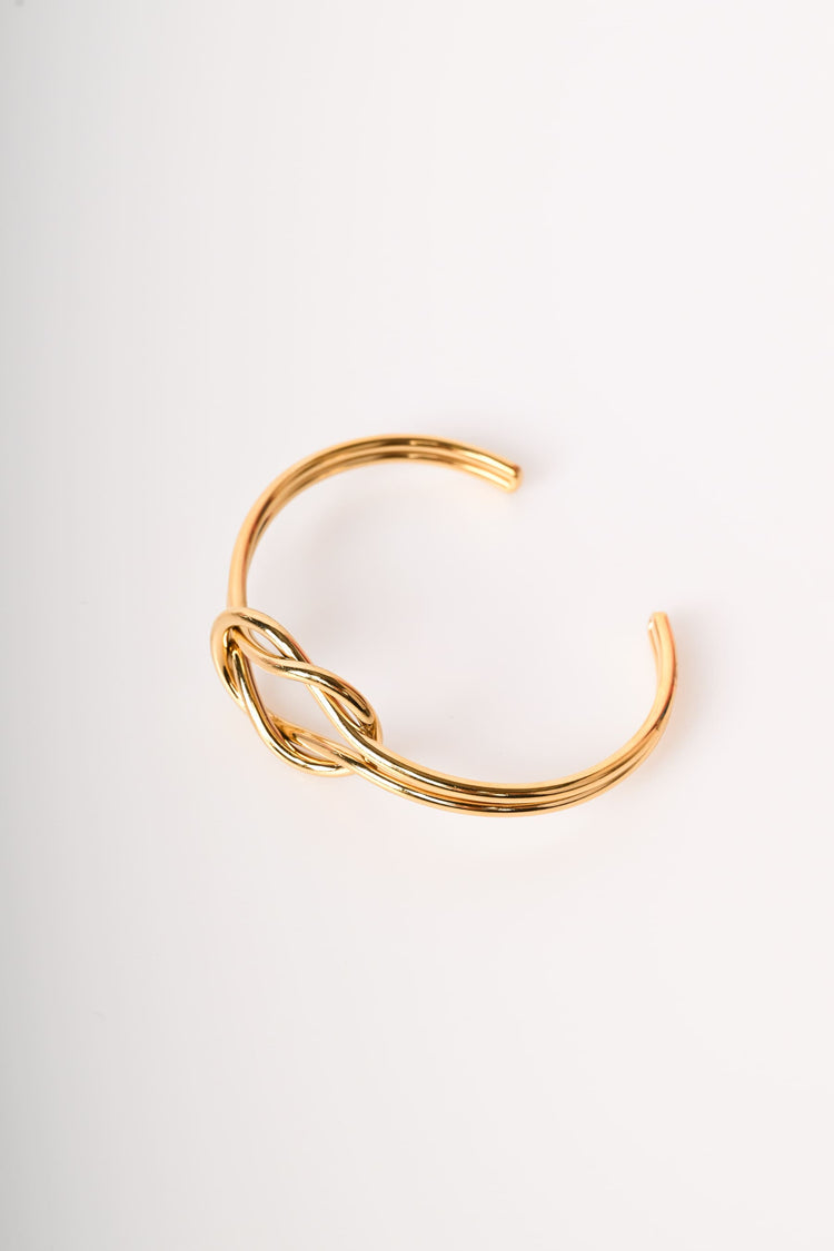 Woven rigid bracelet