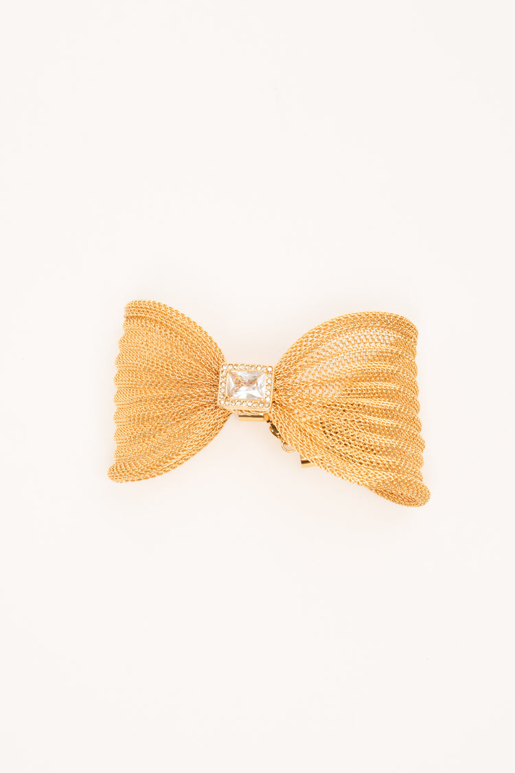 Golden and white filigree bow bracelet