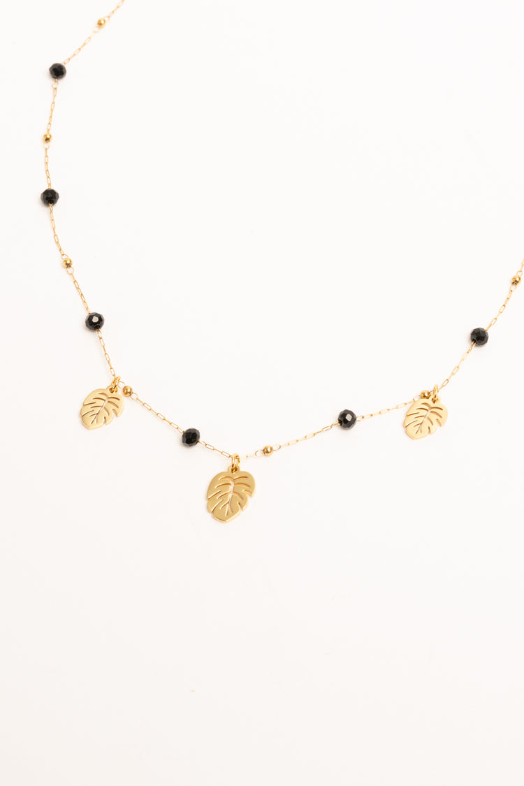 Golden leaf pendant and bead necklace