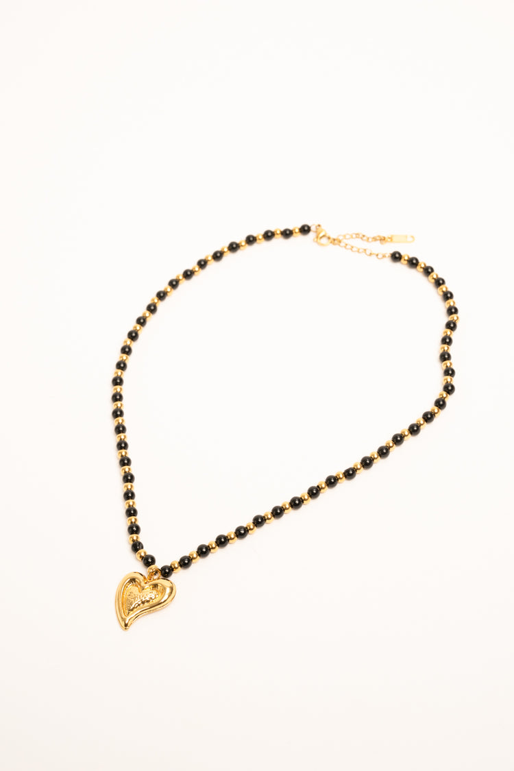 Golden heart pendant bead necklace